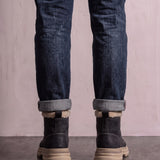 Men's Black Fleece-Lined Lace-Up Boots, back view of the heels, worn.