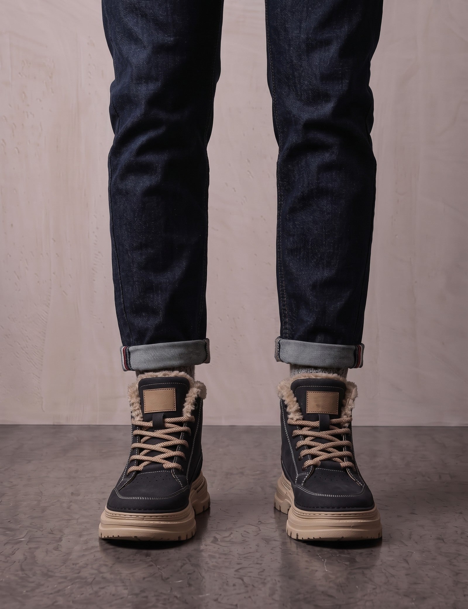 Men's Black Fleece-Lined Lace-Up Boots, front view of the shoes, worn.