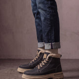 Men's Black Fleece-Lined Lace-Up Boots, side view of the shoe, worn.