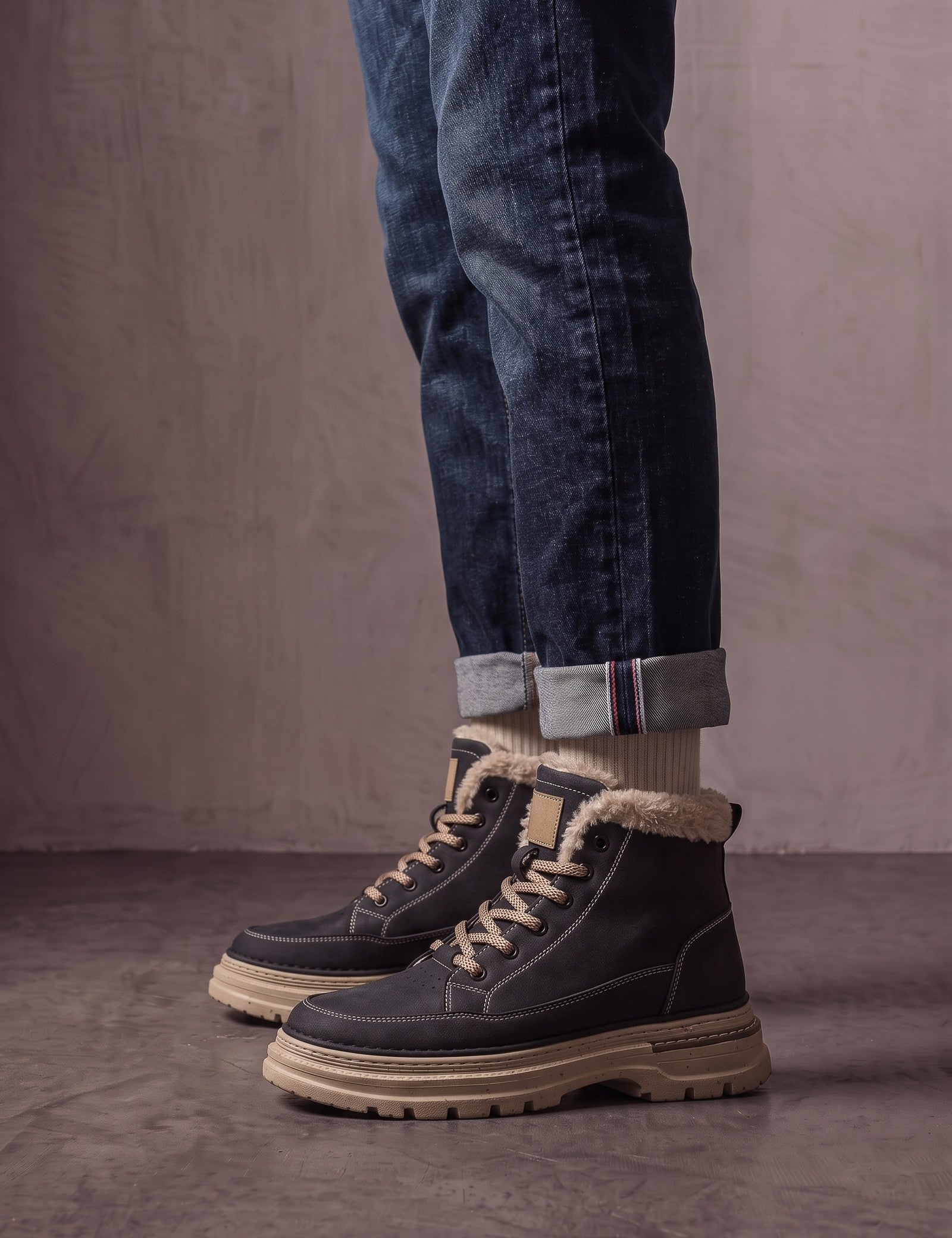 Men's Black Fleece-Lined Lace-Up Boots, side view of the shoe, worn.
