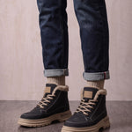 Men's Black Fleece-Lined Lace-Up Boots, three-quarter front view of the shoes, worn.