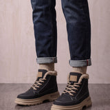 Men's Black Fleece-Lined Lace-Up Boots, three-quarter front view of the shoes, worn.