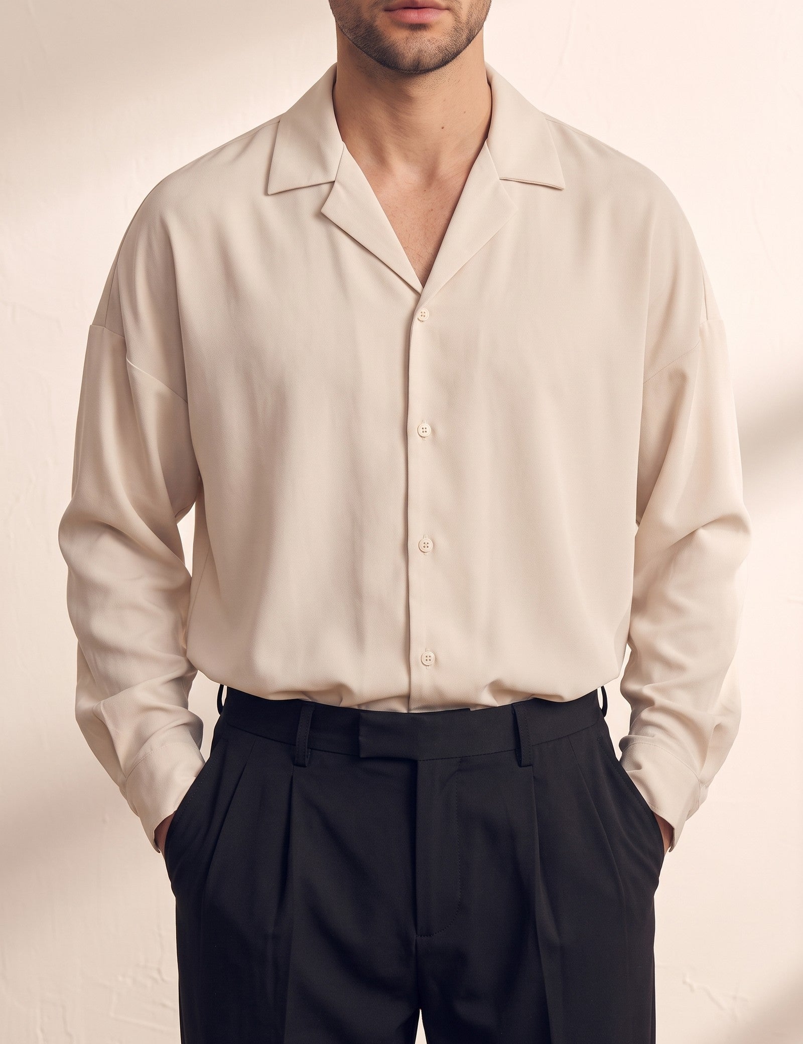 Men's Black Relaxed Fit Cuban Collar Shirt, close-up of the upper body.