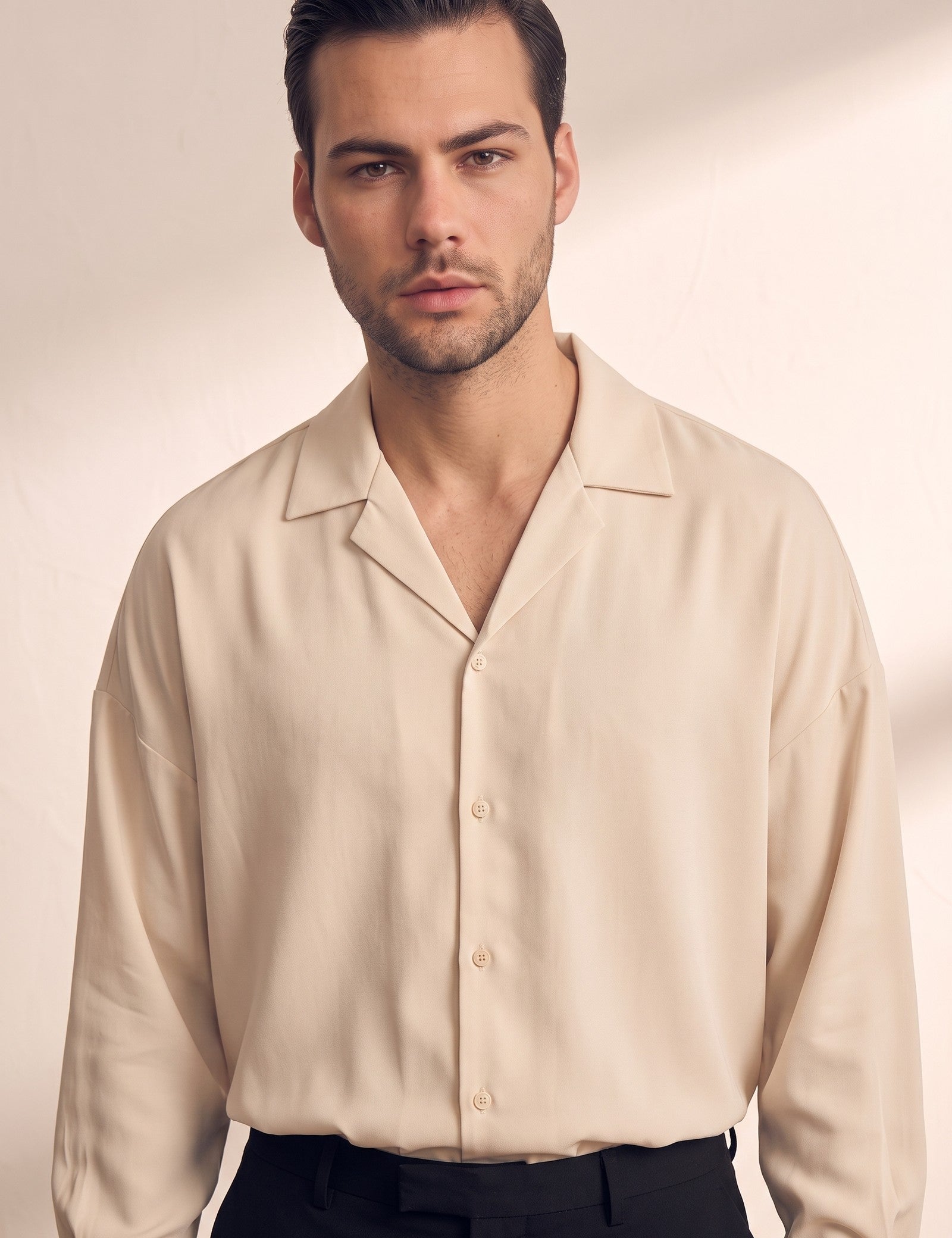 Men's Black Relaxed Fit Cuban Collar Shirt, close-up of the upper body.