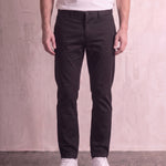 Men's Black Slim Fit Tapered Chino Trousers, front view from the waist down.