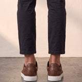 Men's Brown Low-Top Trainers, back view of the heels, worn.