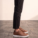 Men's Brown Low-Top Trainers, side view of the shoe, worn.