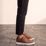 Men's Brown Low-Top Trainers, side view of the shoe, worn.