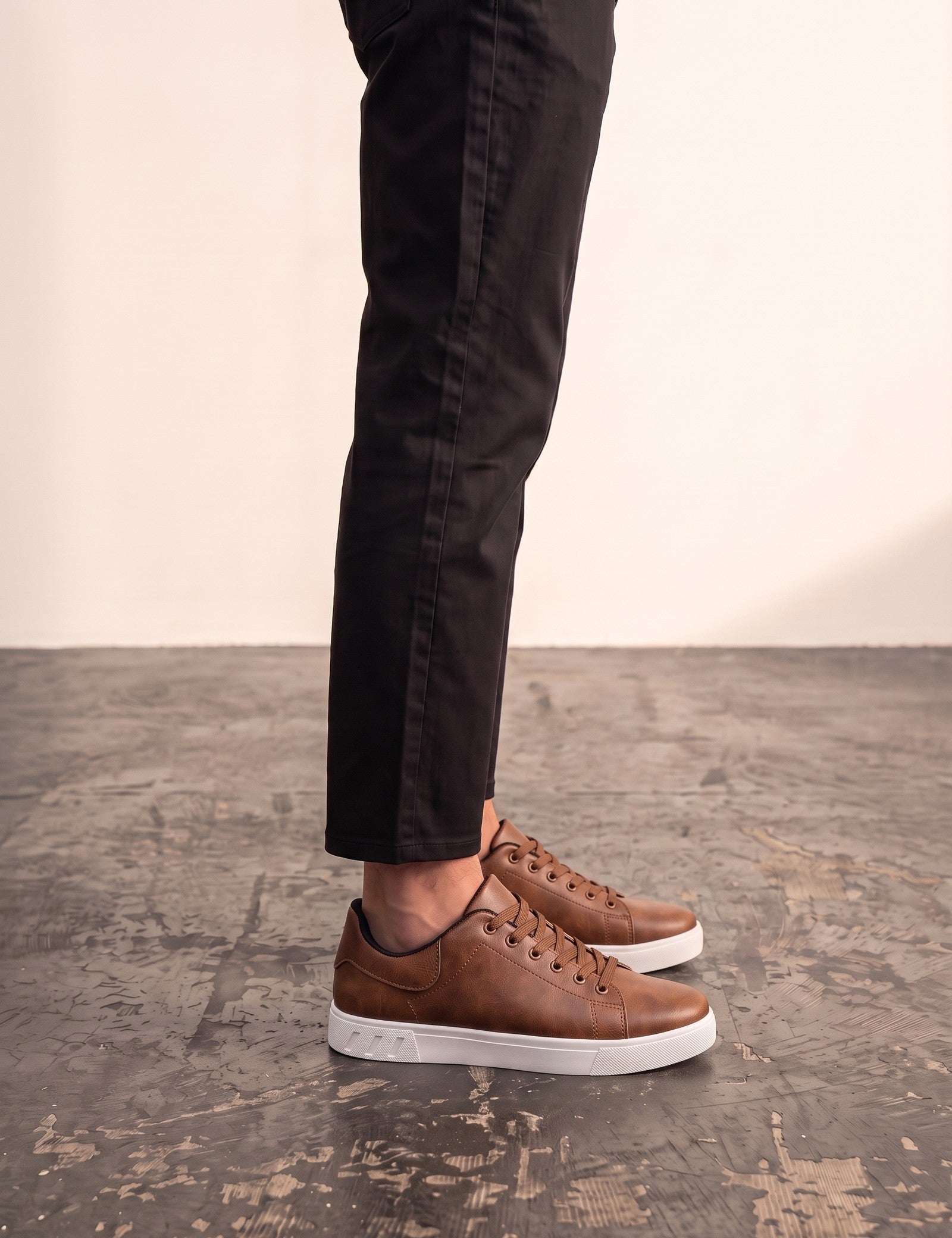 Men's Brown Low-Top Trainers, side view of the shoe, worn.