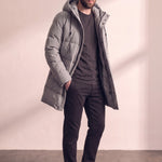 Men's Grey Long Quilted Parka with Drawstring Hood, three-quarter view from the left, full length.