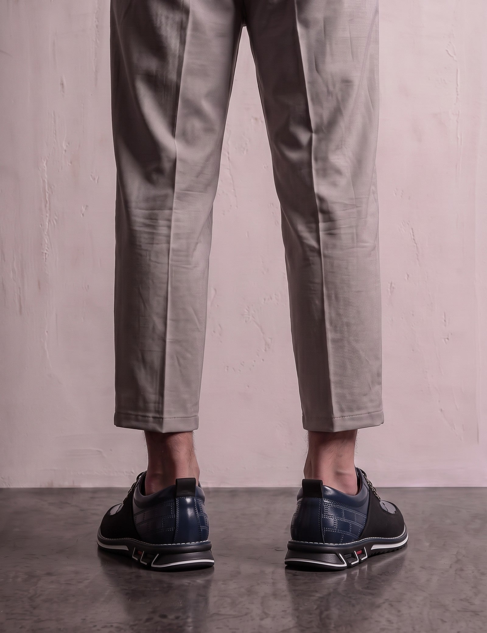 Men's Navy Smart Lace-Up Shoes with Checked Panel, back view of the heels, worn.