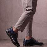 Men's Navy Smart Lace-Up Shoes with Checked Panel, the shoes in mid-step, showing the sole.