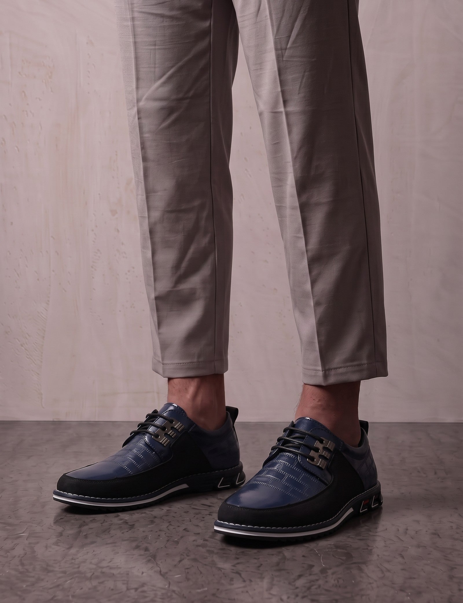 Men's Navy Smart Lace-Up Shoes with Checked Panel, three-quarter front view of the shoes, worn.