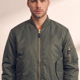 Men's Olive Bomber Jacket with Zip Sleeve Pocket, close-up of the upper body.