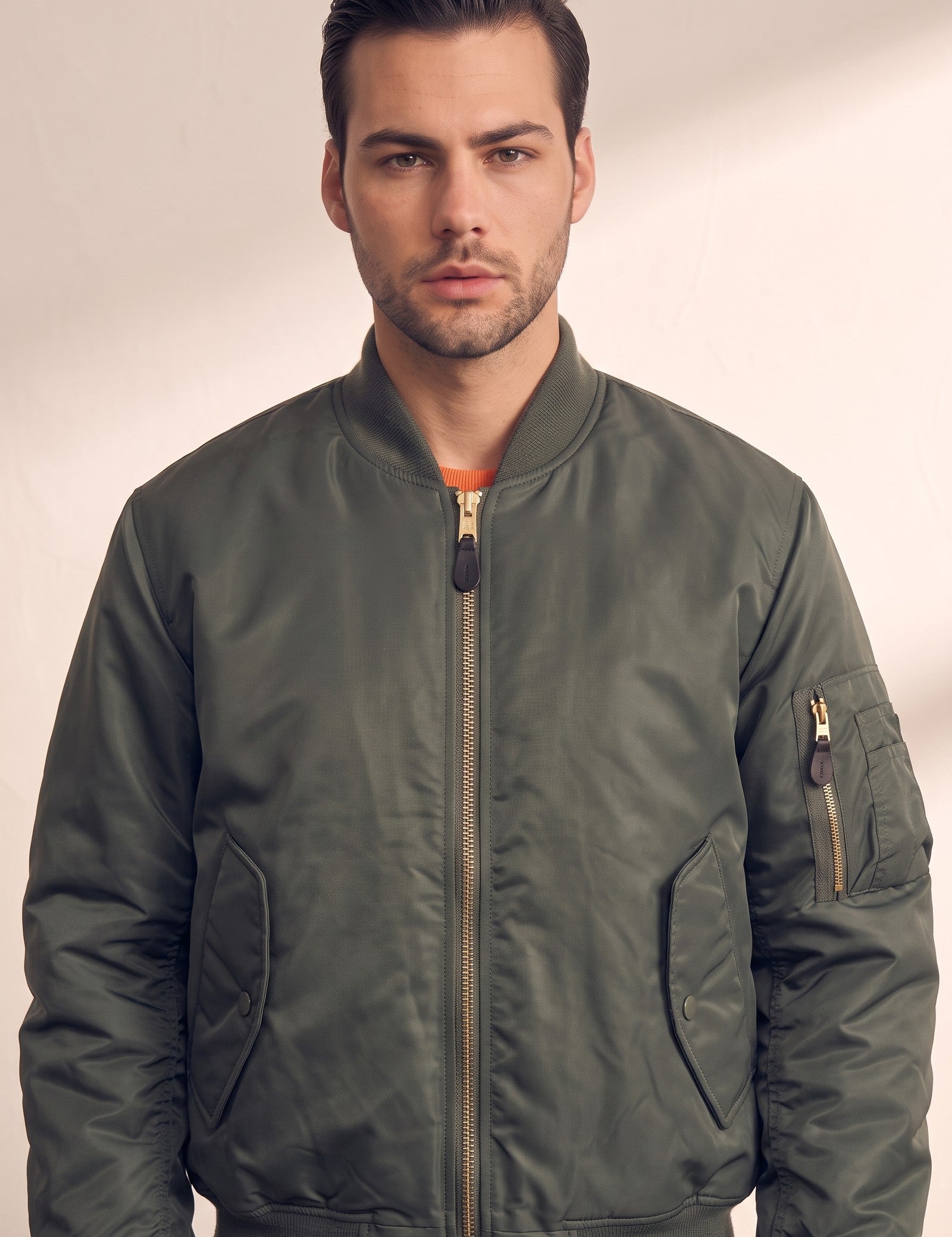 Men's Olive Bomber Jacket with Zip Sleeve Pocket, close-up of the upper body.