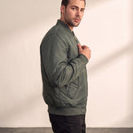 Men's Olive Bomber Jacket with Zip Sleeve Pocket, side view, full length.