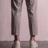 Men's Taupe Faux Leather Low-Top Trainers, back view of the heels, worn.