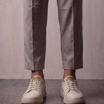Men's Taupe Faux Leather Low-Top Trainers, front view of the shoes, worn.