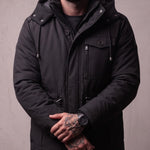 Men's Anthracite Hooded Padded Parka with Pockets, close-up of the upper body.