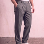 Men's Anthracite Pleated Straight-Leg Suit Trousers, three-quarter view from the waist down.