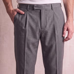 Men's Anthracite Pleated Straight-Leg Suit Trousers, close-up of the waistband and front pocket.