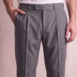 Men's Anthracite Pleated Straight-Leg Suit Trousers, close-up of the waistband and front pocket.