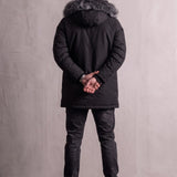 Men's Black Hooded Parka with Fur-Effect Trim, back view, full length.