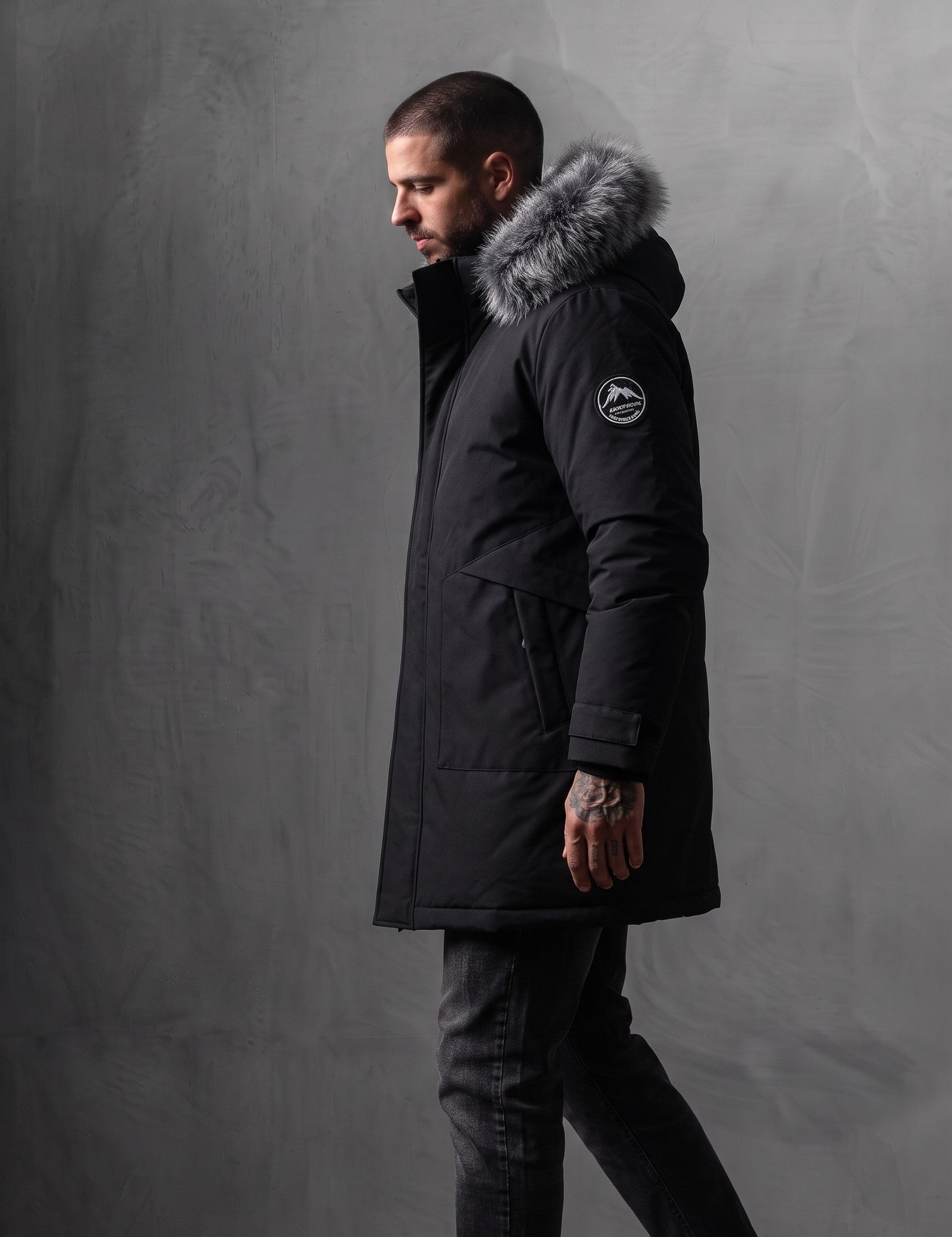 Men's Black Hooded Parka with Fur-Effect Trim, side view, full length.