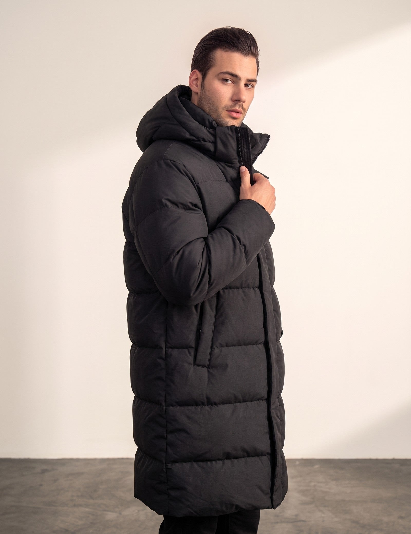 Men's Black Longline Hooded Puffer Coat, side view, full length.