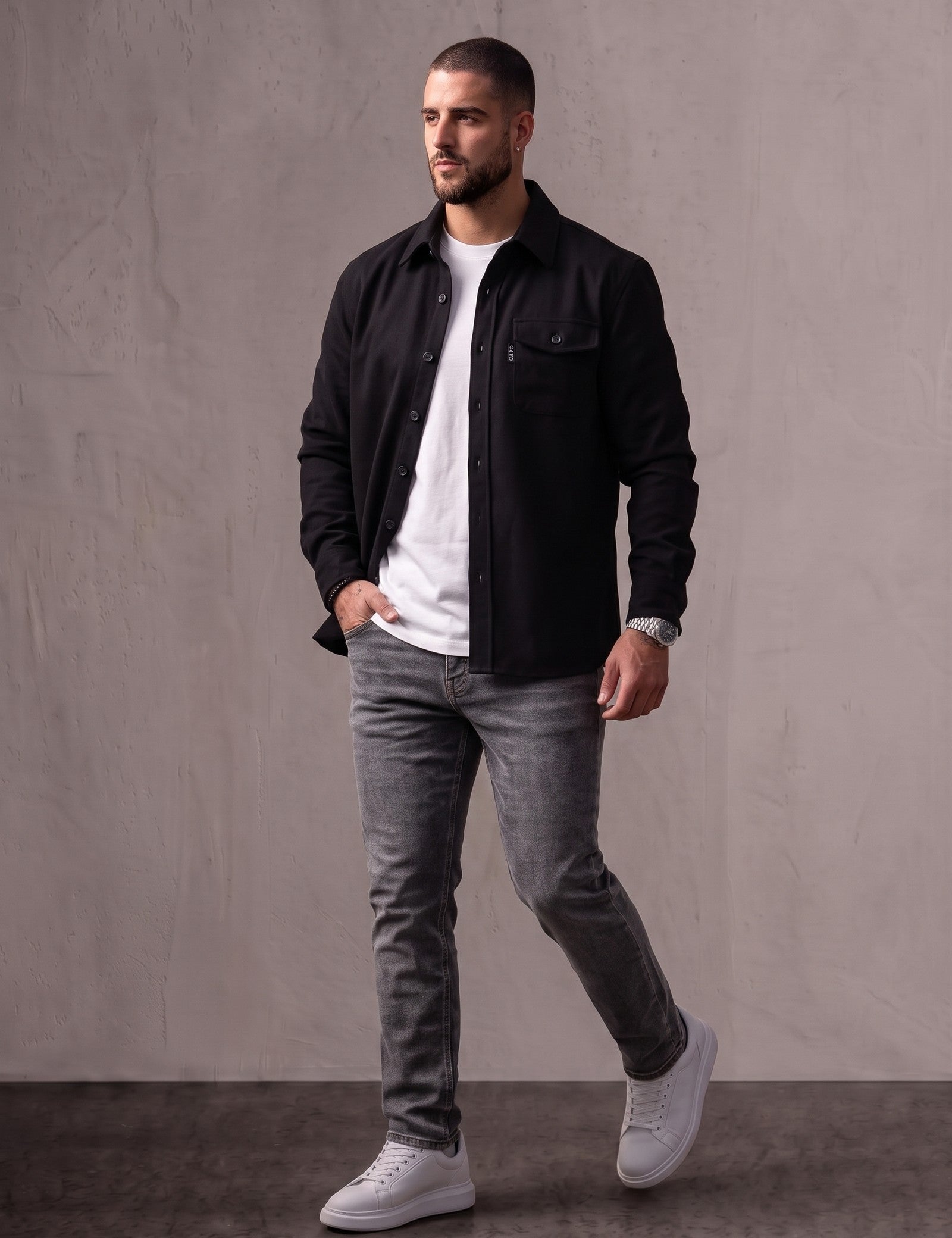Men's Black Stretch Button Overshirt, three-quarter view from the right, full length