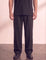 Men's Black Wide Leg Pleated Trousers, front view from the waist down.