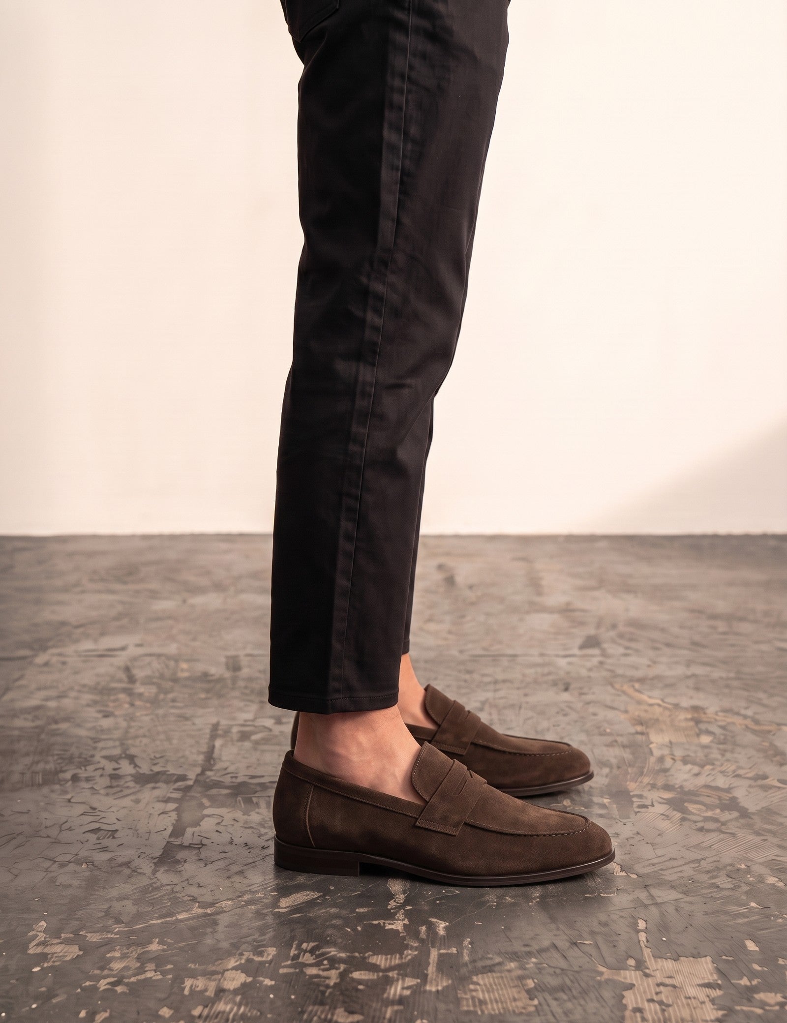 Men's Brown Suede-Effect Penny Loafers, side view of the shoe, worn.