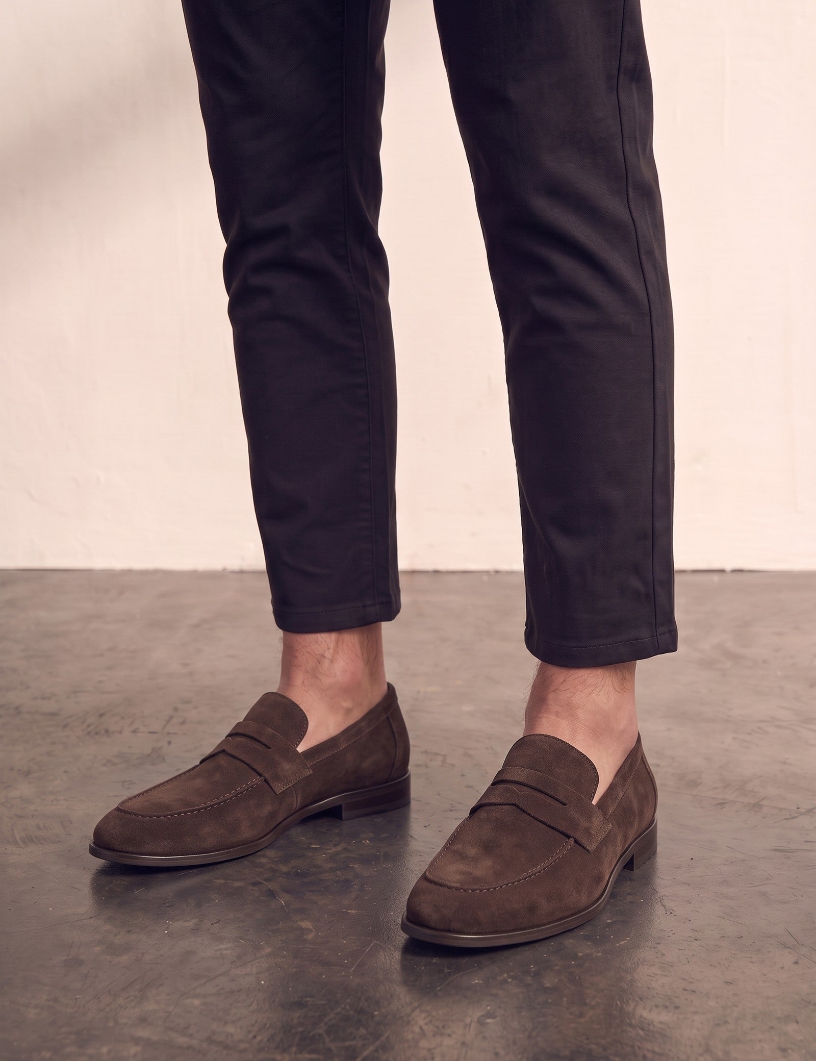 Men's Brown Suede-Effect Penny Loafers, three-quarter front view of the shoes, worn.