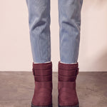 Men's Burgundy Quilted Snow Boots with Ankle Strap, front view of the shoes, worn.
