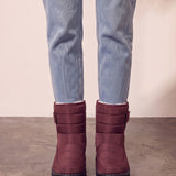 Men's Burgundy Quilted Snow Boots with Ankle Strap, front view of the shoes, worn.