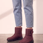 Men's Burgundy Quilted Snow Boots with Ankle Strap, side view of the shoe, worn.