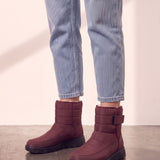 Men's Burgundy Quilted Snow Boots with Ankle Strap, side view of the shoe, worn.