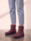 Men's Burgundy Quilted Snow Boots with Ankle Strap, side view of the shoe, worn.