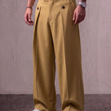 Men's Camel Wide-Leg Pleated Trousers with Button Tabs, three-quarter view from the waist down.