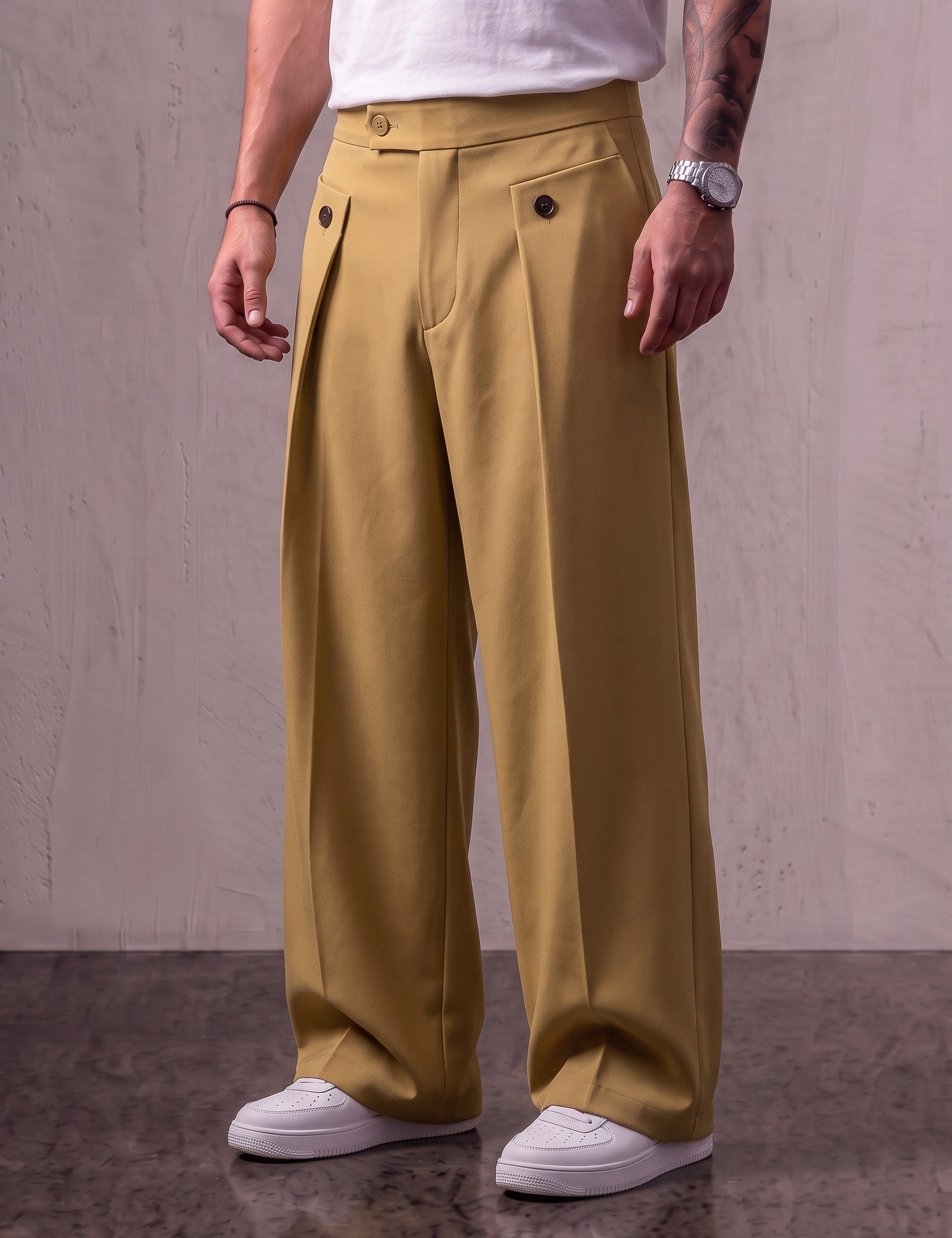 Men's Camel Wide-Leg Pleated Trousers with Button Tabs, three-quarter view from the waist down.