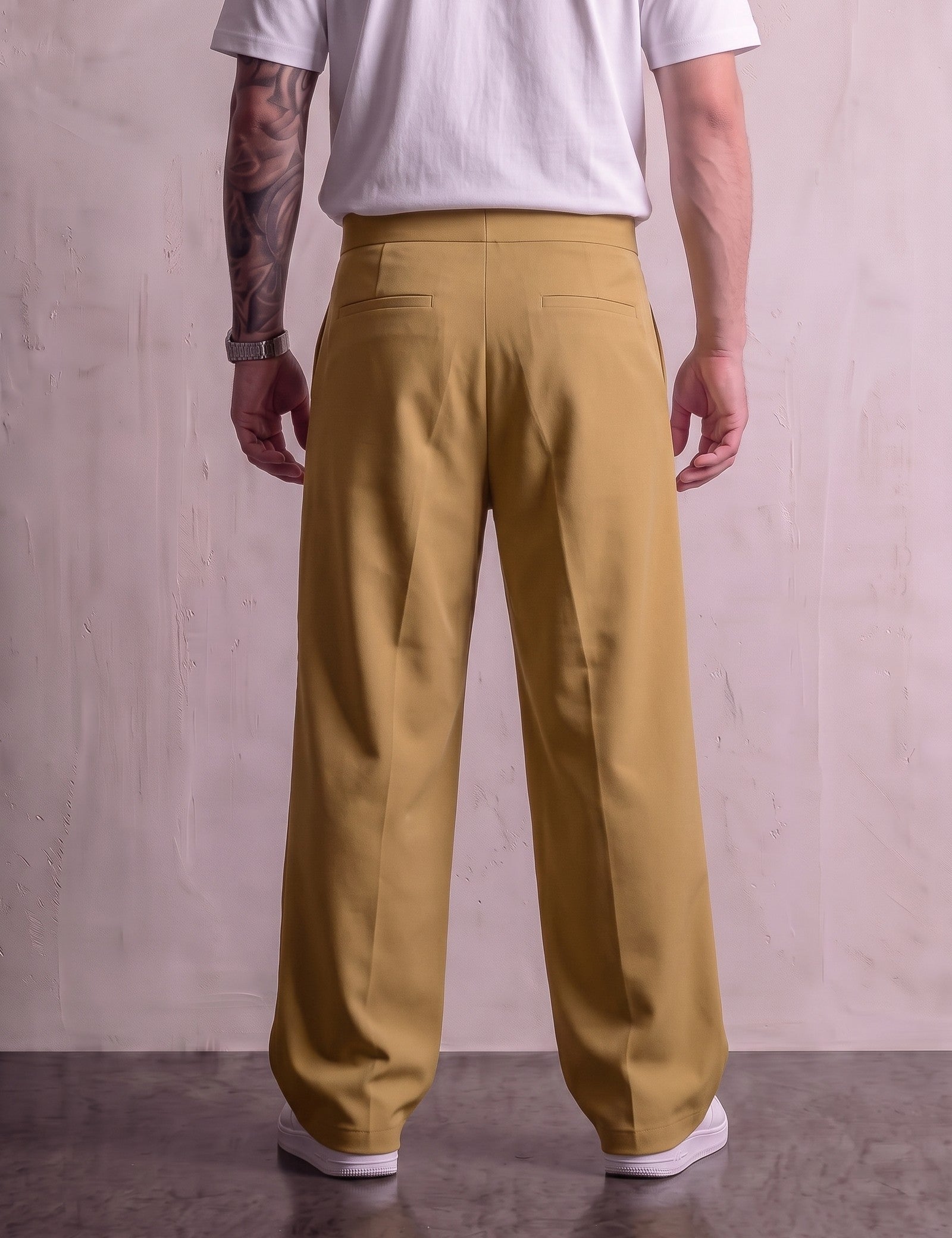 Men's Camel Wide-Leg Pleated Trousers with Button Tabs, back view from the waist down.