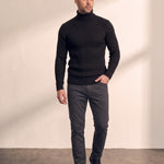 Men's Cream Slim Fit Cable Knit Roll Neck Jumper - Black, back view, full length.
