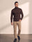 Men's Cream Slim Fit Cable Knit Roll Neck Jumper - Brown, front view, full length.