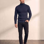 Men's Cream Slim Fit Cable Knit Roll Neck Jumper - Navy Blue, back view, full length.