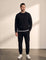 Men's Crew Neck Jumper in Black, front view, full length