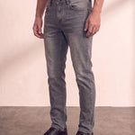 Men's Grey Slim Fit Stretch Denim Jeans, three-quarter view from the waist down.