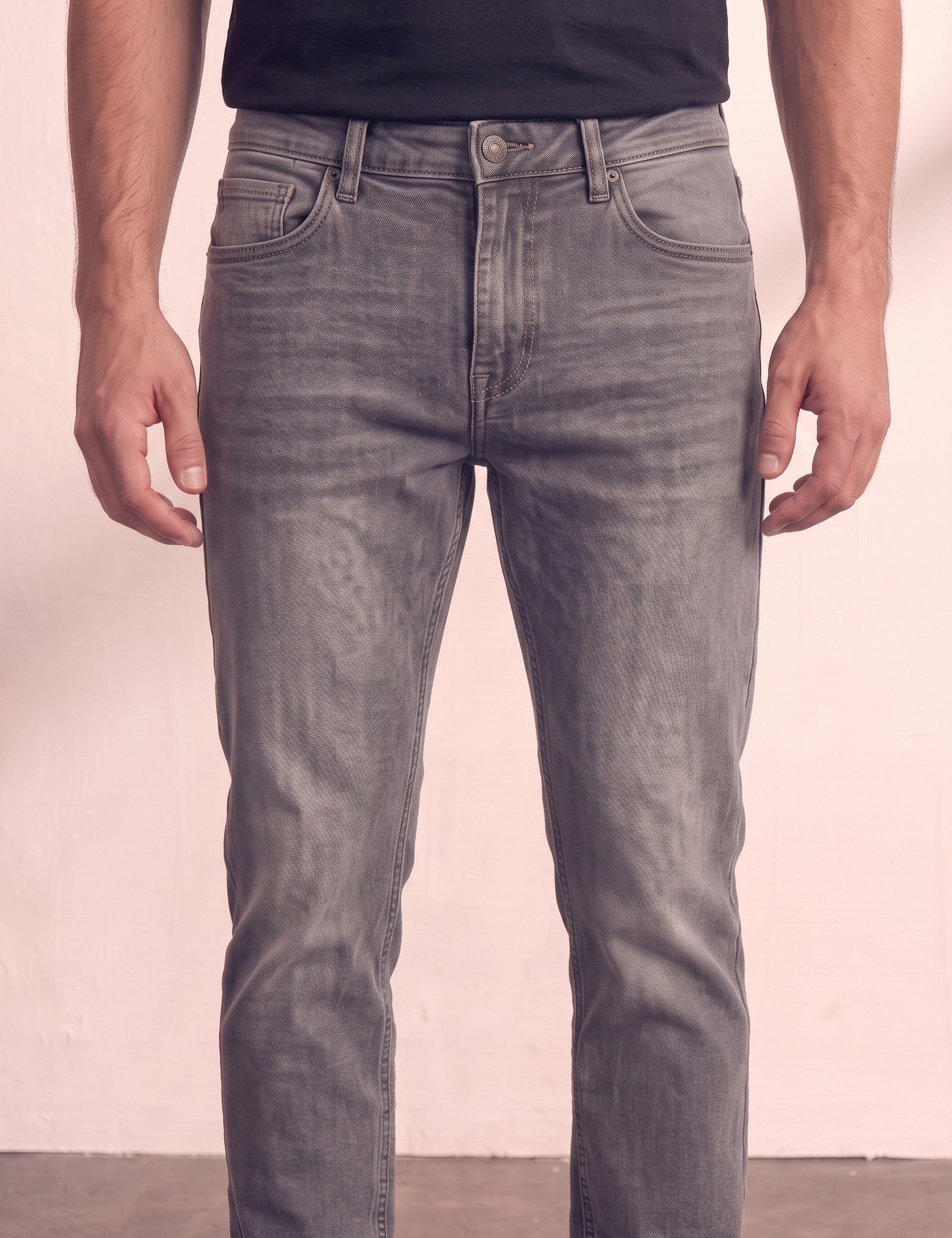 Men's Grey Slim Fit Stretch Denim Jeans, close-up of the waistband and front pocket.