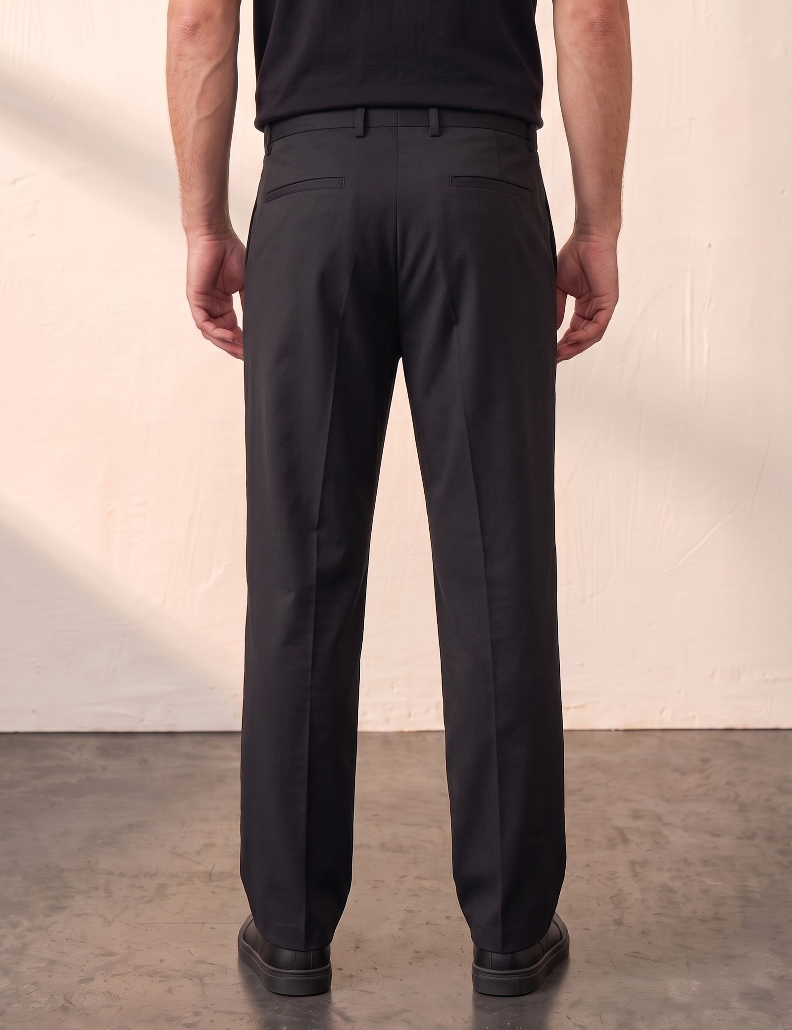 Men's Light Grey Pleated Straight Leg Trousers, back view from the waist down.