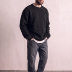 Men's Navy Brushed Knit Crew Neck Jumper - Black, three-quarter view from the left, full length.