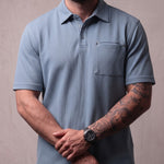 Men's Piqué Polo Shirt with Chest Pocket, close-up of the upper body